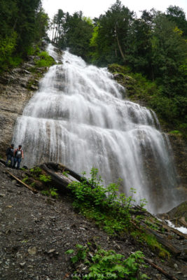 A photo from the base looking upwards at the cascading falls.