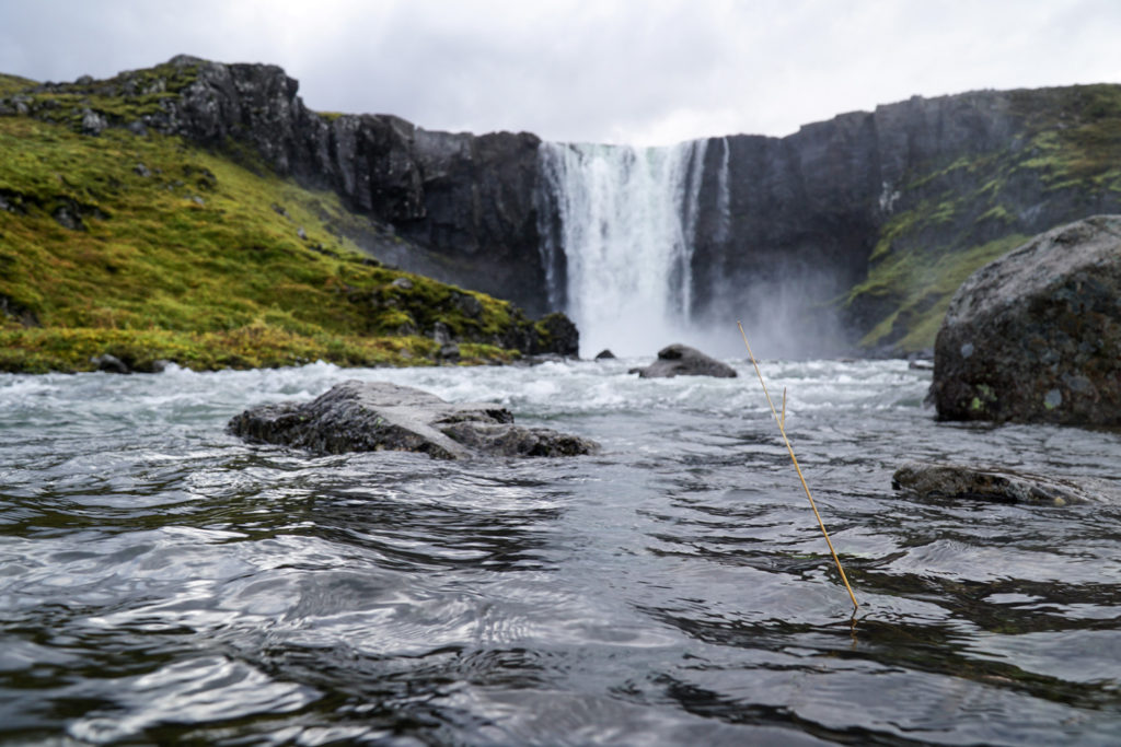 River in the foreground and the small pretty waterfall called gufufoss