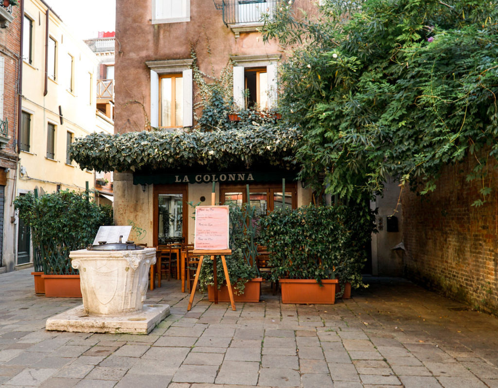 La Colonna, a small restaurant hidden within the alleys and walkways of Venice, Italy - Kraska Fox